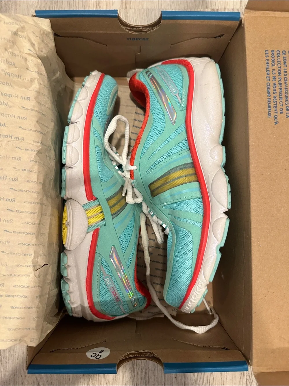 Brooks Women's Mint Green Running Shoe with Coral and Yellow Trim